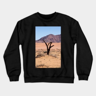 One tree in the desert. Crewneck Sweatshirt